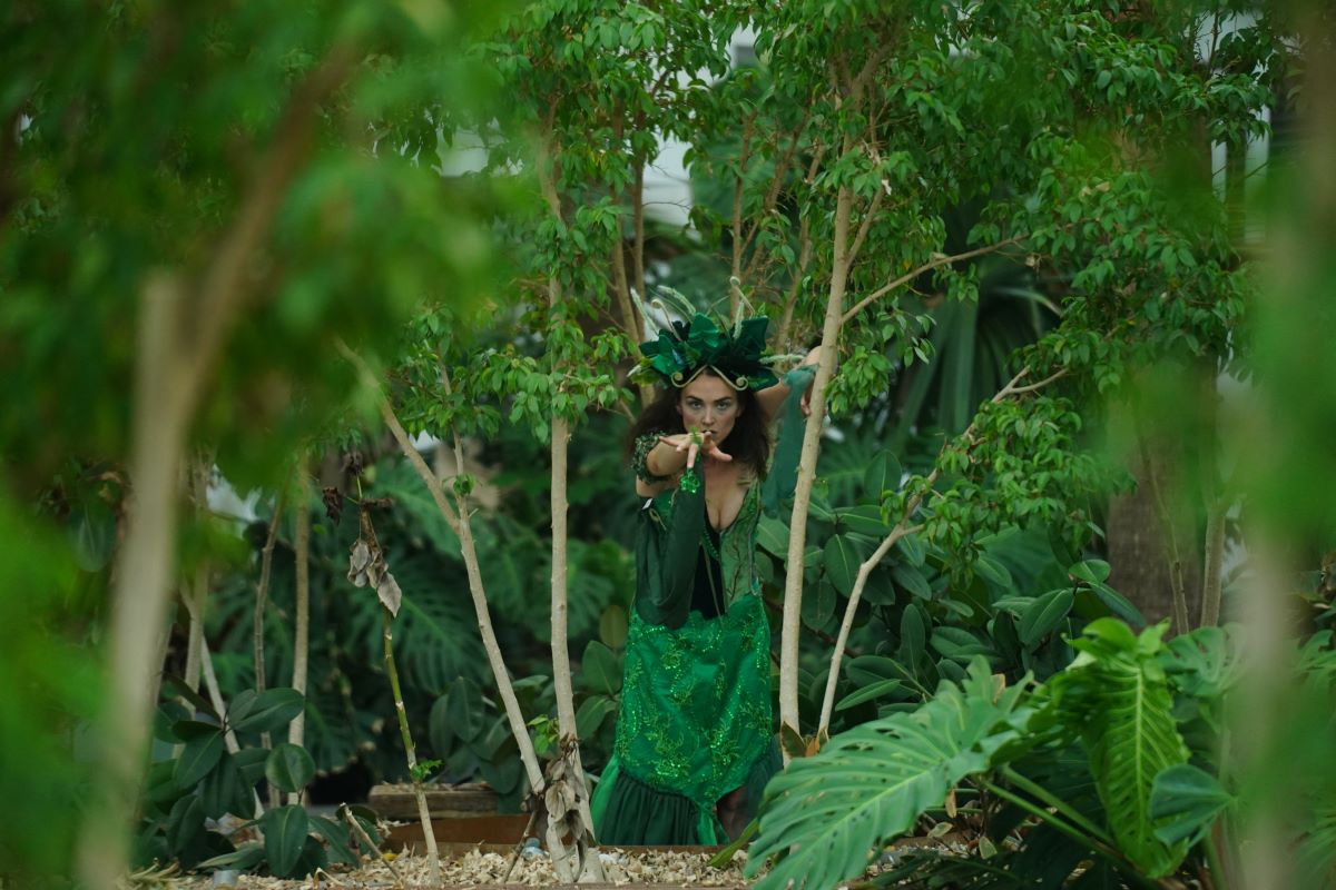 Woman in Trees Reaching Out at Navy Pier's Garden of Decay